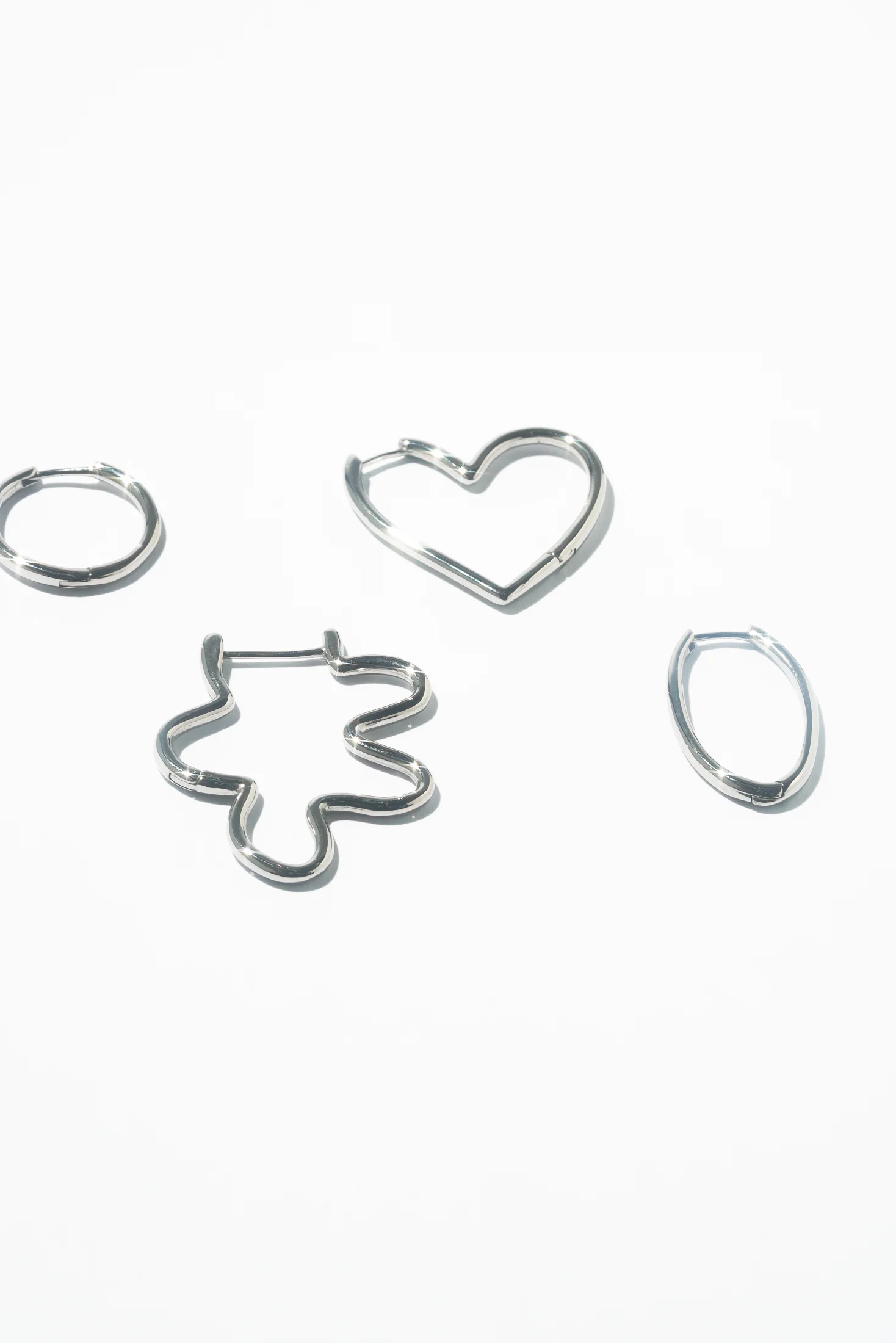 Infinity Oval Hoops (Pair) - Image 6