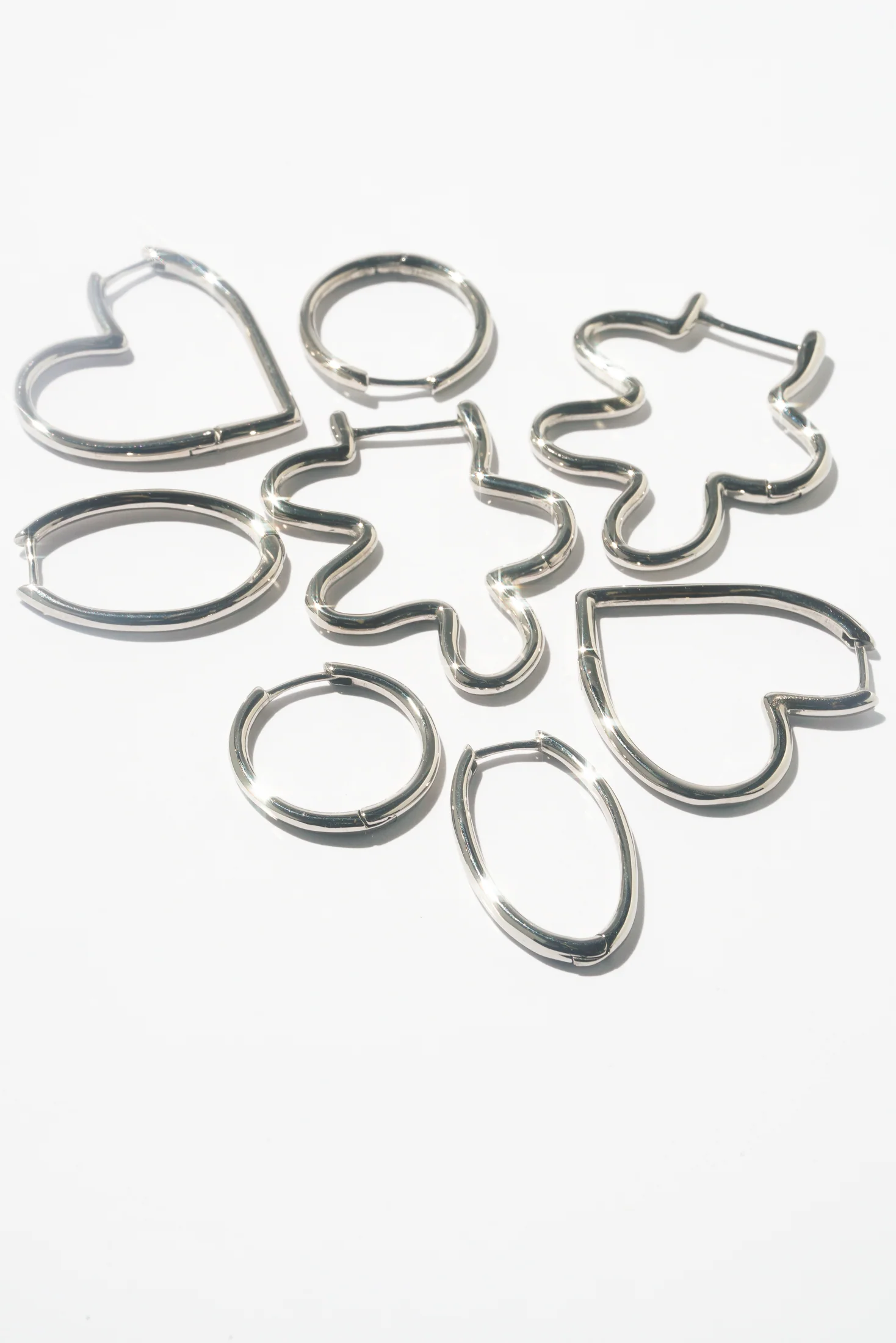 Infinity Oval Hoops (Pair) - Image 8